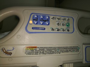 controls on side of Hill-Rom VersaCare bed