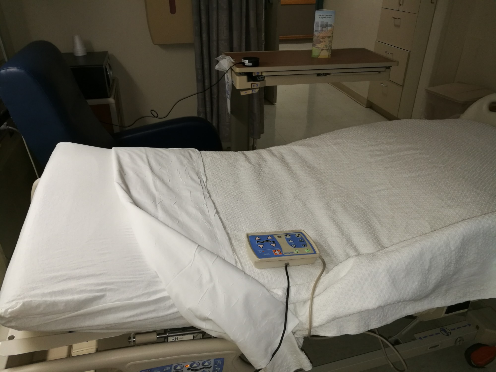 voice activated hospital bed pendant on bed
