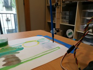 paintbrush and painting of robotic painter
